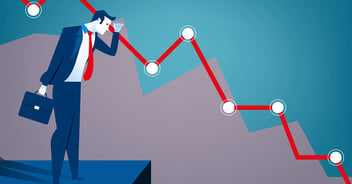 An illustration of a business man in a blue suit with a red tie holding a briefcase stands on a dark blue platform and looks downwards, along the sinking profile of a red line graph, which remains visible in the background of the frame and is punctuated by a series of white dots