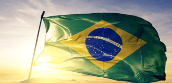 Brazil flag with the sun shining on it